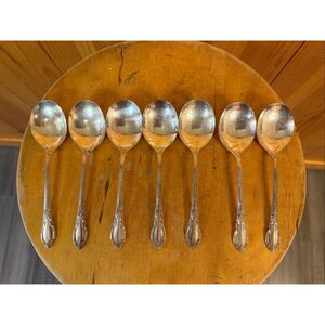 Oneida Rogers 1881 Ltd Enchantment  Lot Of 7 bouillon spoons (7241)